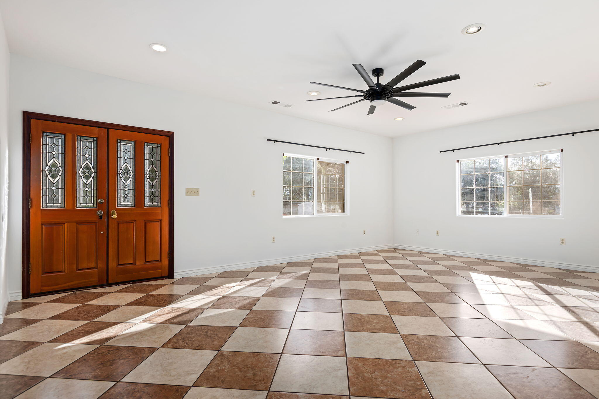 717 West Villanova Road Ojai, CA 93023 - Photo 2 of 34 a view of a livingroom with a window and a ceiling fan