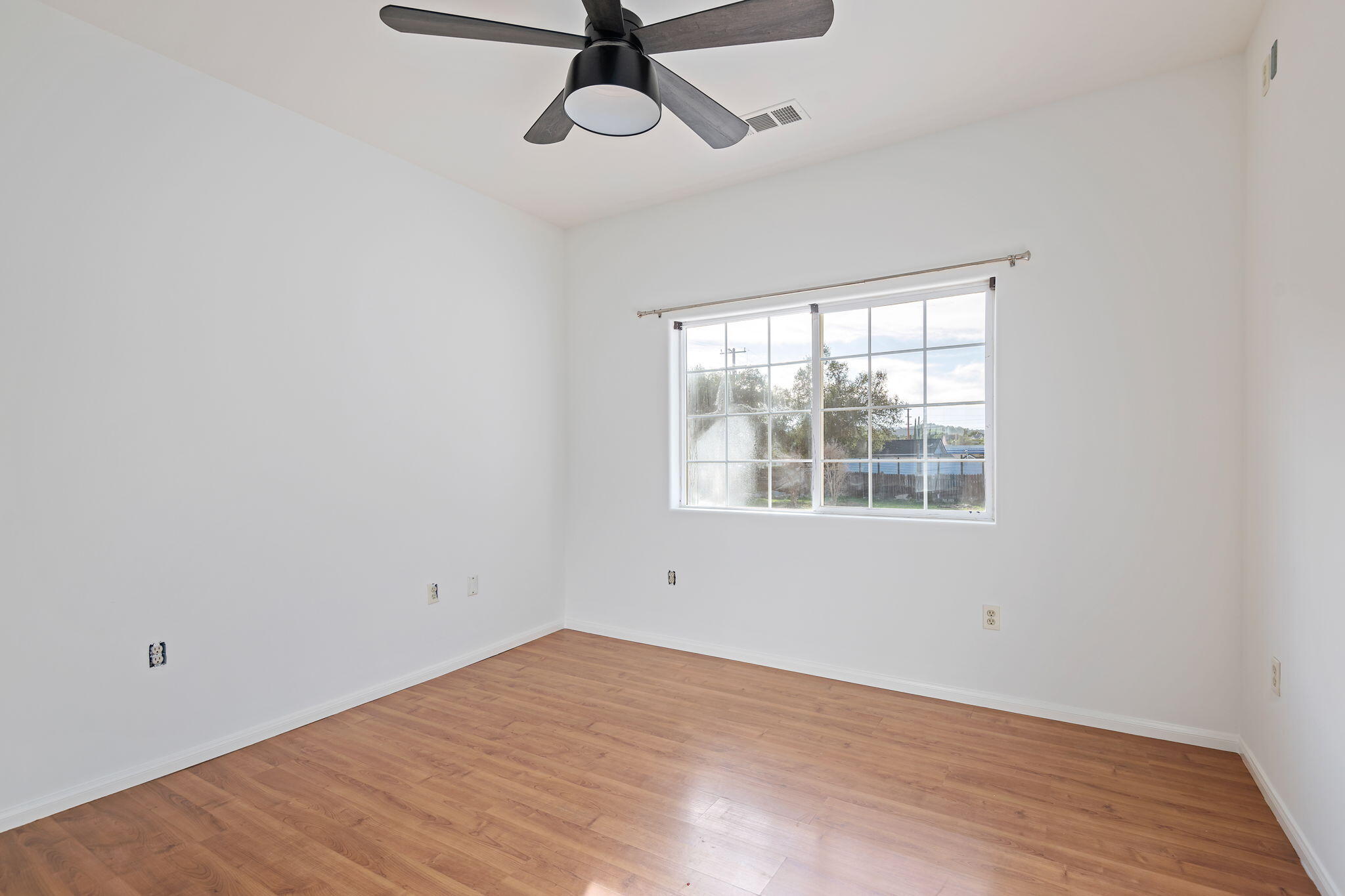 717 West Villanova Road Ojai, CA 93023 - Photo 23 of 34 wooden floor in an empty room with a window