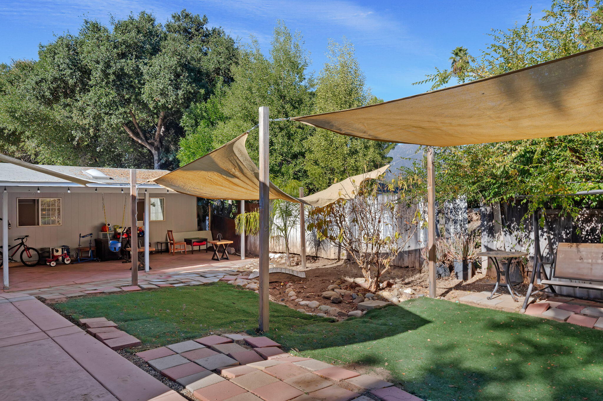 717 West Villanova Road Ojai, CA 93023 - Photo 29 of 34 a view of a patio with table and chairs under an umbrella