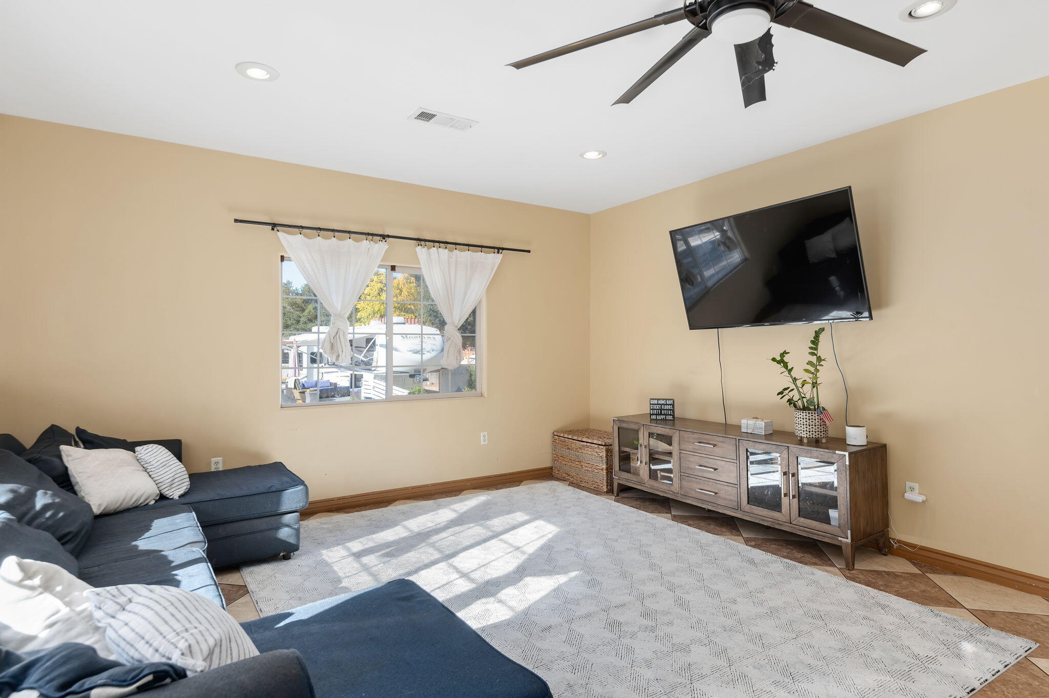717 West Villanova Road Ojai, CA 93023 - Photo 10 of 34 a living room with furniture and a flat screen tv