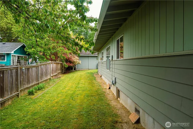 a house with swimming pool in front of it