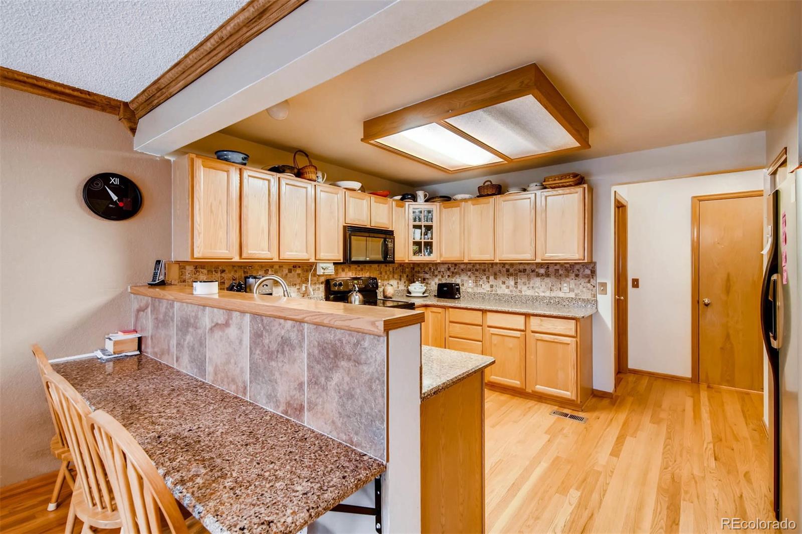 2218 Hyacinth Road Highlands Ranch, CO 80129 - Photo 12 of 28 Gallery Image 12
