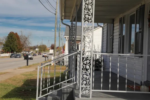 a view of a balcony with city view
