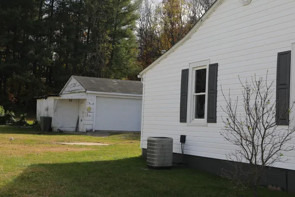 a view of a living room with wooden floor