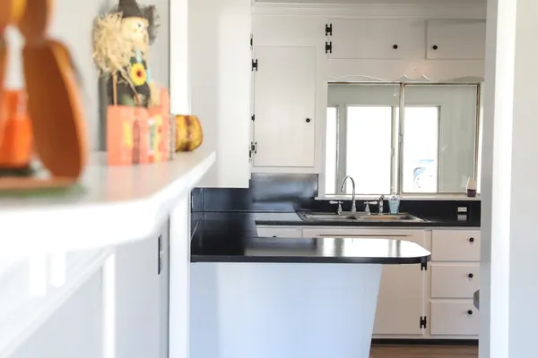 a bathroom with a tub and a sink