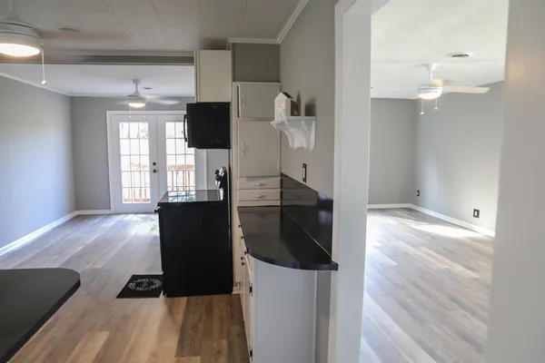 a view of a bathroom from a hallway