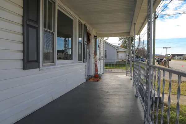 front view of a house with a street