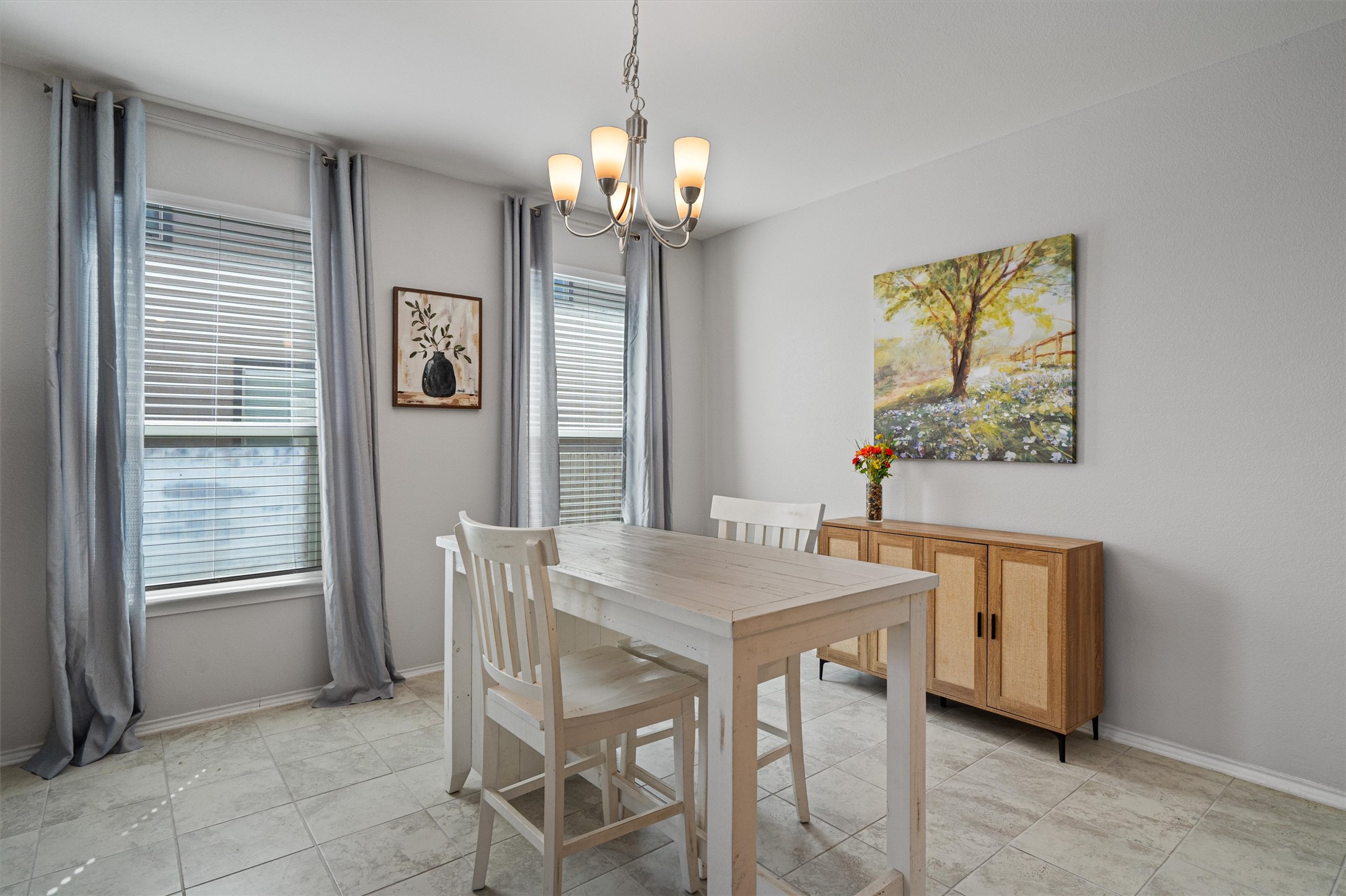 1906 Dragonfly Loop Bastrop, TX 78602 - Photo 12 of 34 a dining room with a table and chairs