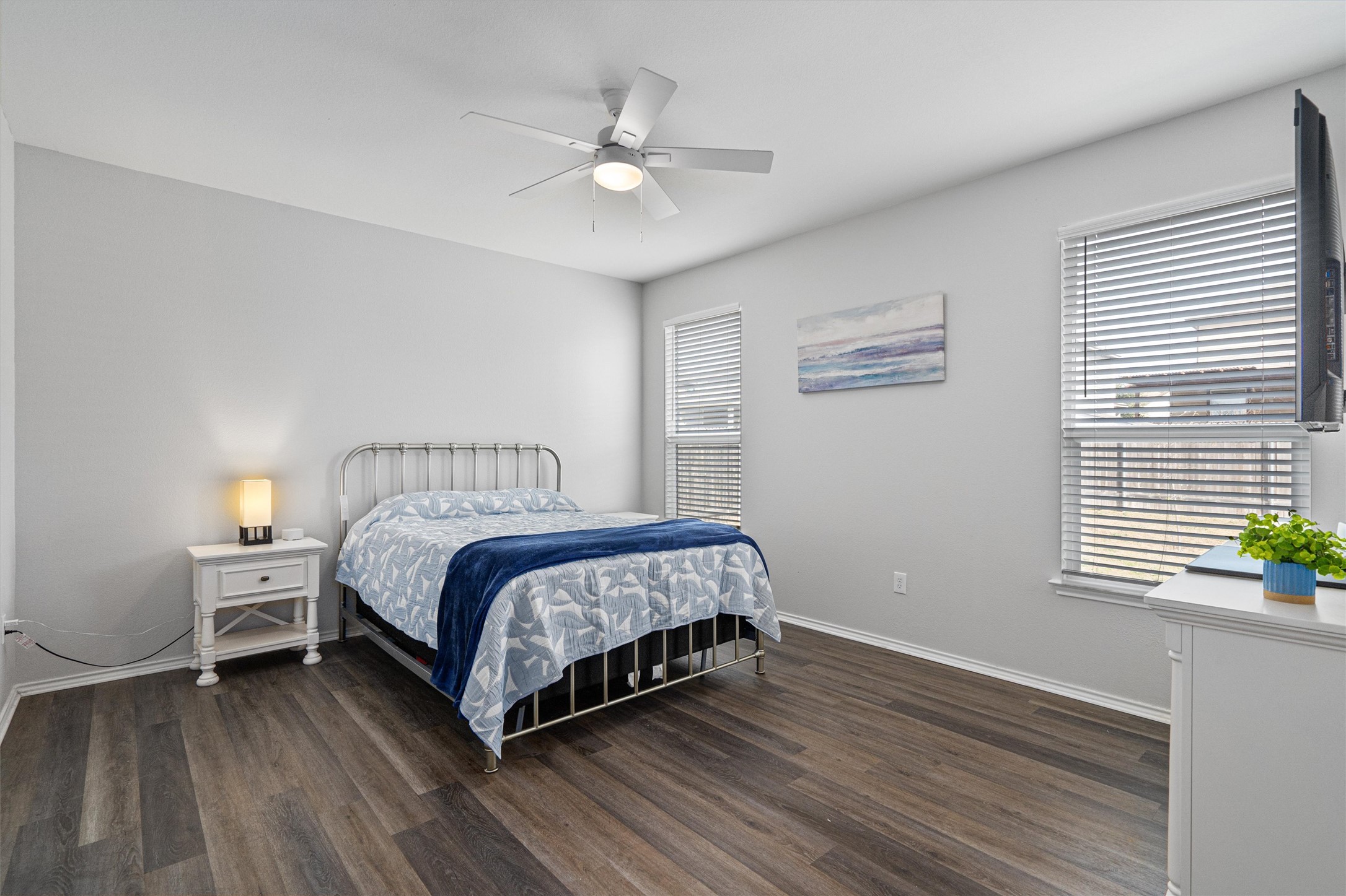 1906 Dragonfly Loop Bastrop, TX 78602 - Photo 17 of 34 a bedroom with a bed and a window