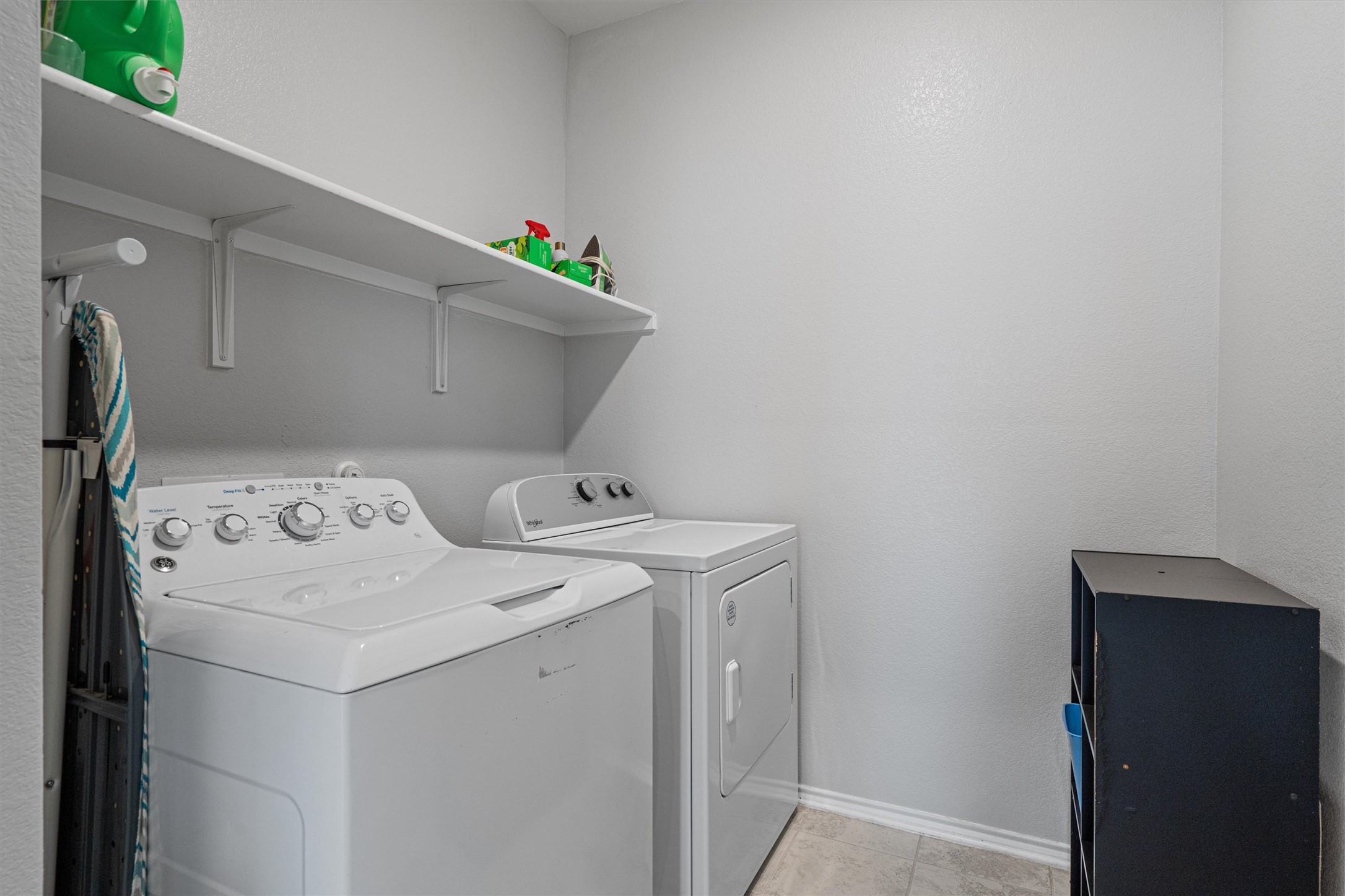 1906 Dragonfly Loop Bastrop, TX 78602 - Photo 27 of 34 a utility room with dryer and washer