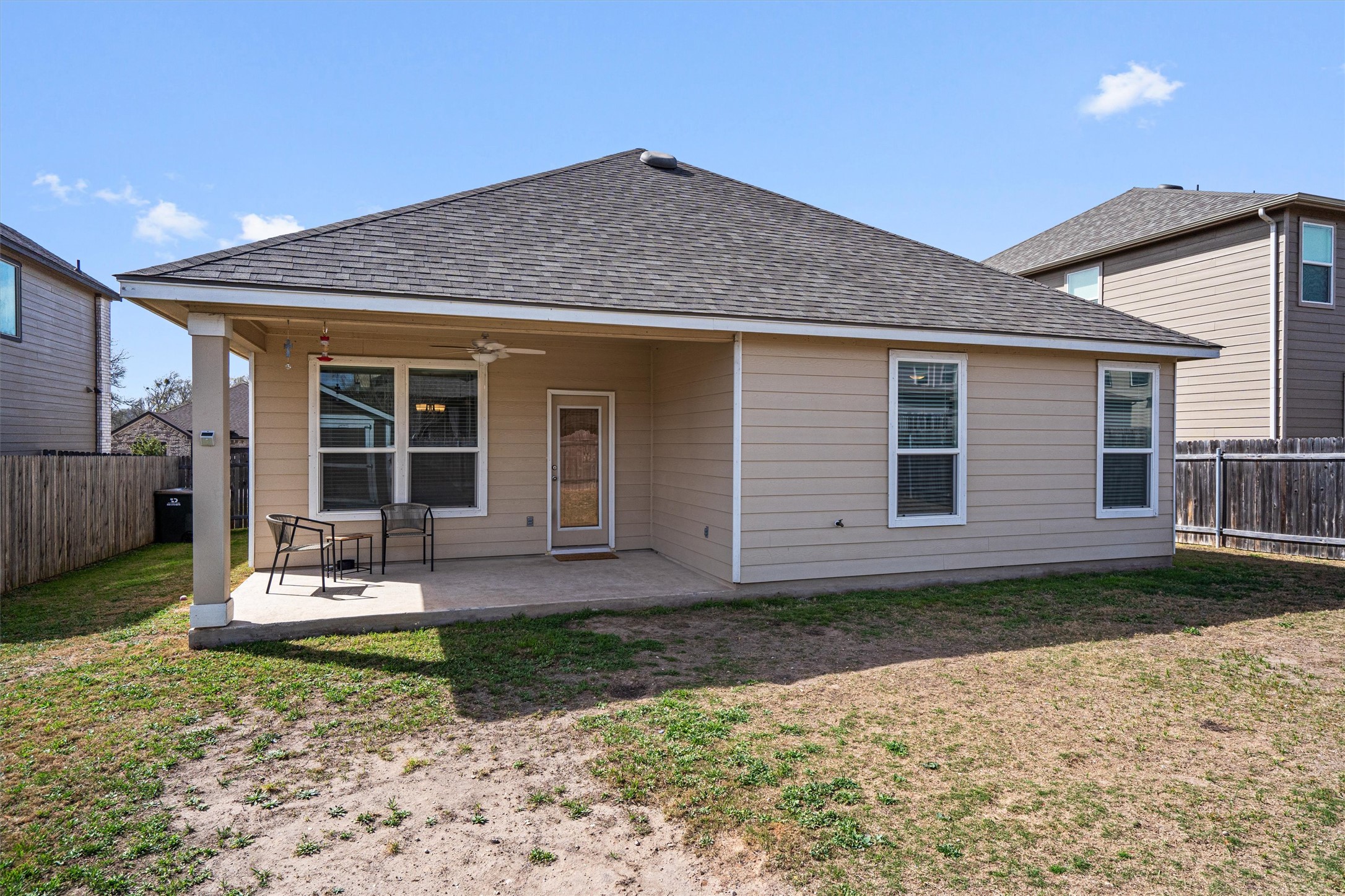 1906 Dragonfly Loop Bastrop, TX 78602 - Photo 28 of 34 a front view of a house with garden
