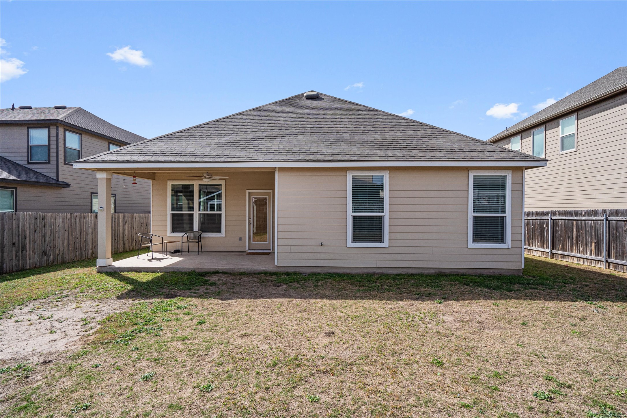 1906 Dragonfly Loop Bastrop, TX 78602 - Photo 29 of 34 a house with yard in front of it