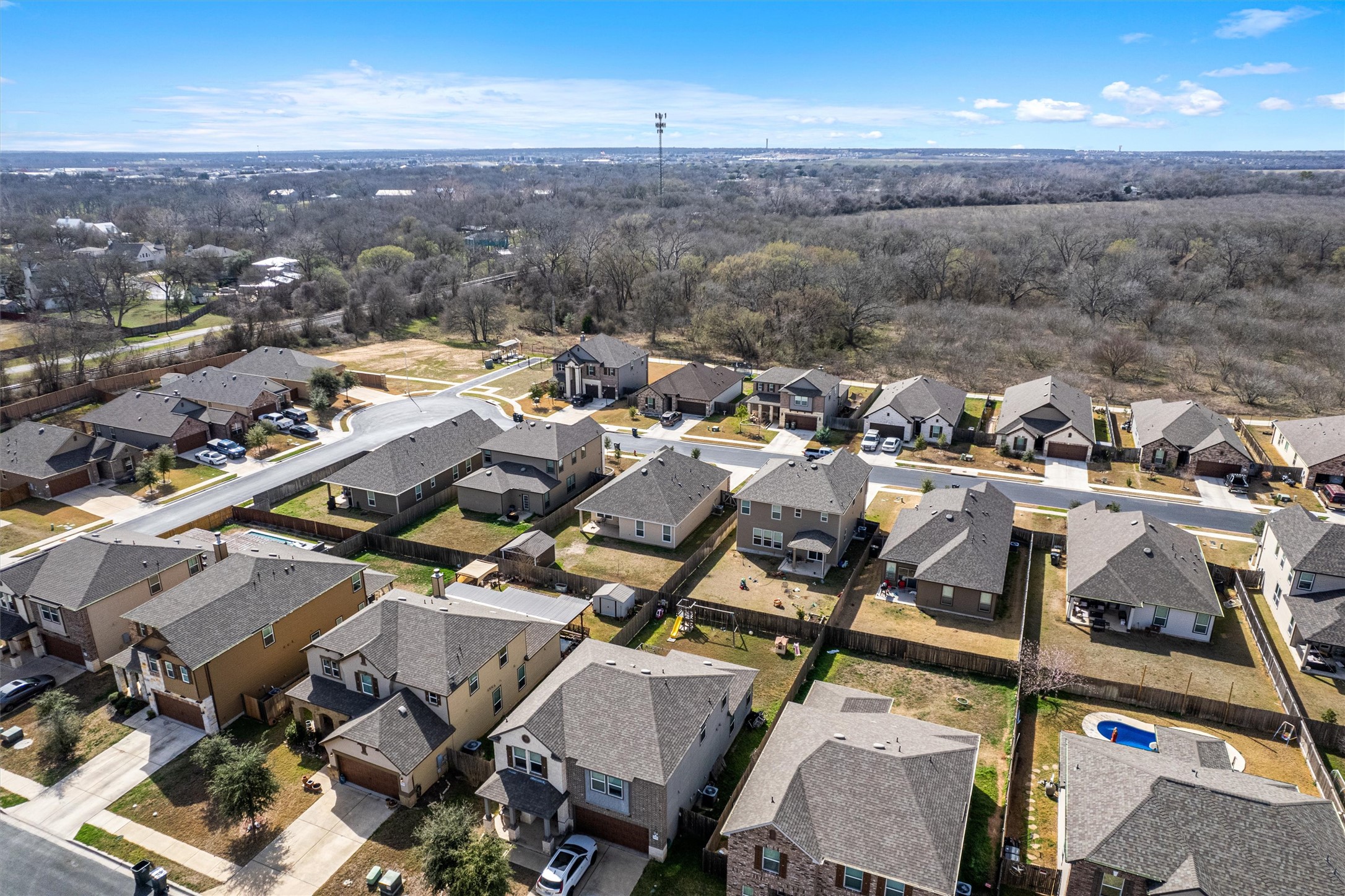 1906 Dragonfly Loop Bastrop, TX 78602 - Photo 33 of 34 an aerial view of a city