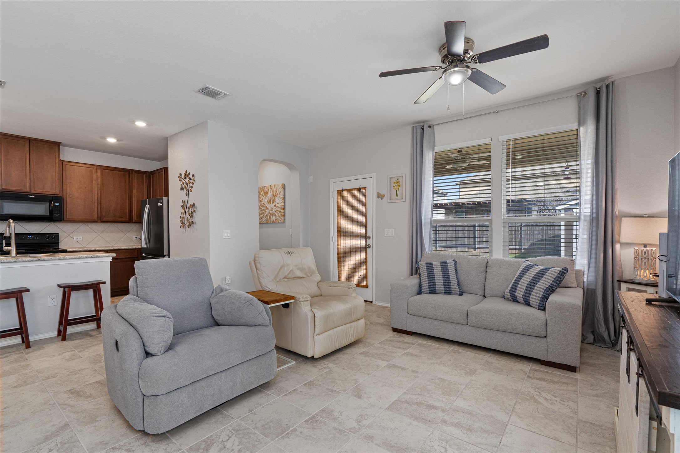 1906 Dragonfly Loop Bastrop, TX 78602 - Photo 10 of 34 a living room with furniture and a large window