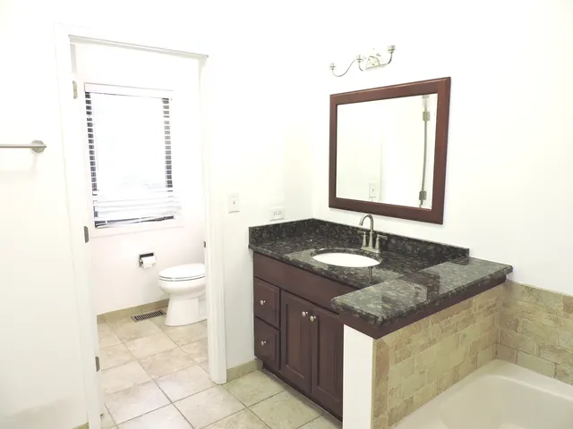 an empty room with fan