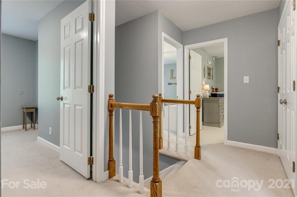 124 Friendfield Drive Fort Mill, SC 29715 - Photo 22 of 42 a view of a hallway with wooden floor and entryway