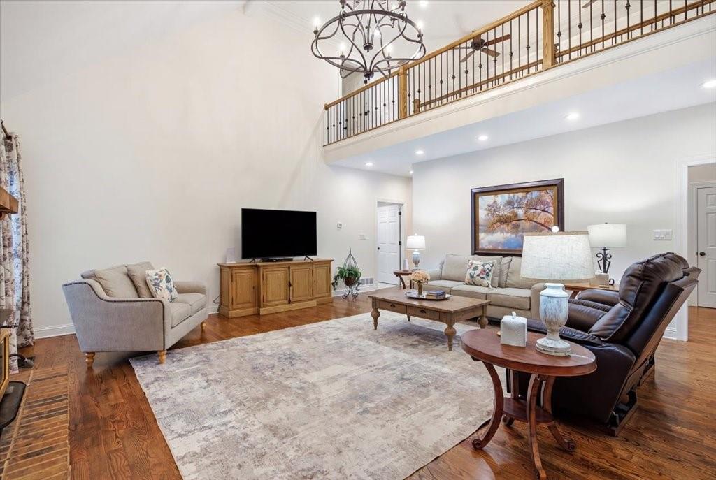 397 Thomas Road Dallas, GA 30132 - Photo 16 of 108 a living room with furniture and a flat screen tv