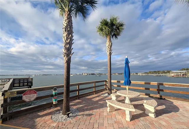 $575,000 | 100 Bluff View Drive, Unit 105C, Belleair Bluffs, FL 33770