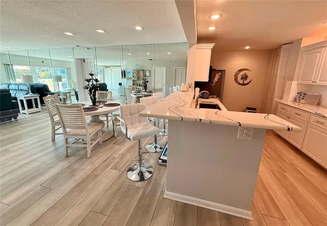 $575,000 | 100 Bluff View Drive, Unit 105C, Belleair Bluffs, FL 33770