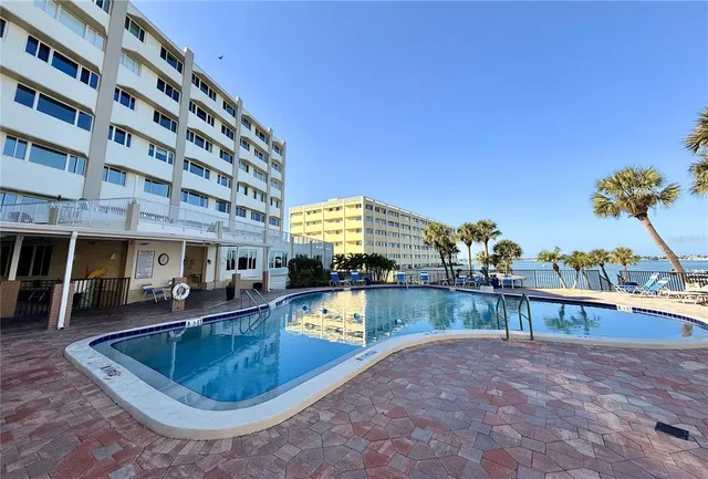 $575,000 | 100 Bluff View Drive, Unit 105C, Belleair Bluffs, FL 33770