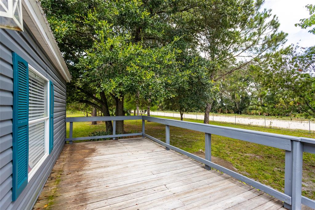 1013 Forest Park Street Bunnell, FL 32110 - Photo 20 of 24 a view of outdoor space with trees in the background