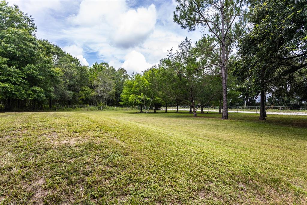 1013 Forest Park Street Bunnell, FL 32110 - Photo 22 of 24 a view of outdoor space with playground