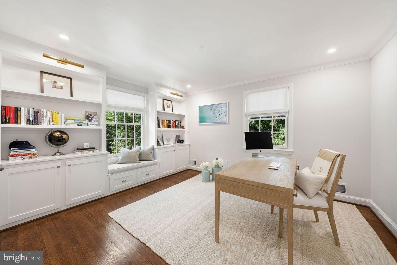 4555 W Street Northwest Washington, DC 20007 - Photo 15 of 34 a room with furniture and a wooden floor