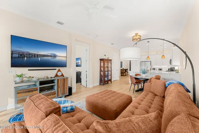 a bathroom with double vanity sinks a vanity a lamp and a mirror