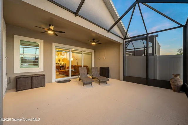 a view of a lake with a house in the background