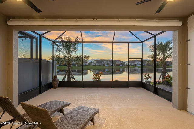 a view of a livingroom with furniture and white walls