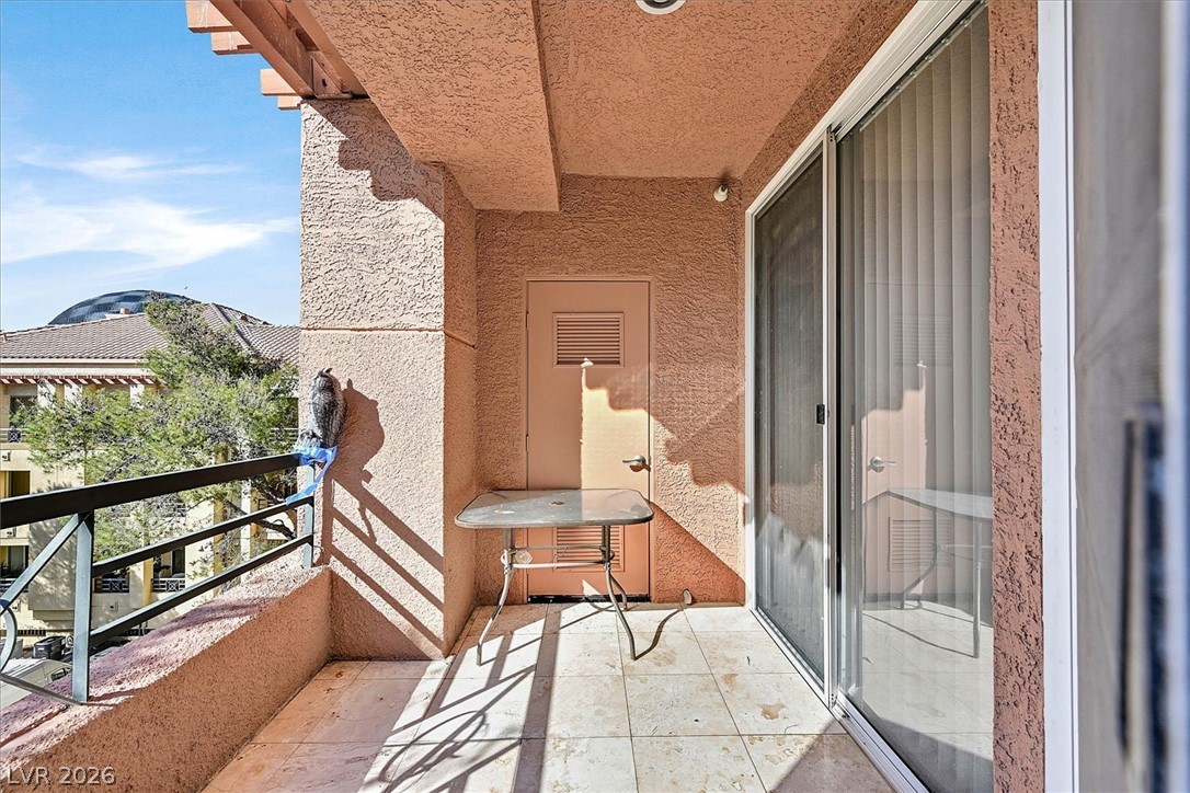 220 East Flamingo Road, Unit 305 Las Vegas, NV 89169 - Photo 14 of 26 An inviting balcony space with ample natural light, perfect for morning coffee.