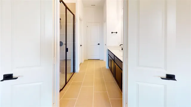 a view of a hallway with a couch