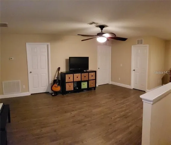 a view of a livingroom with furniture