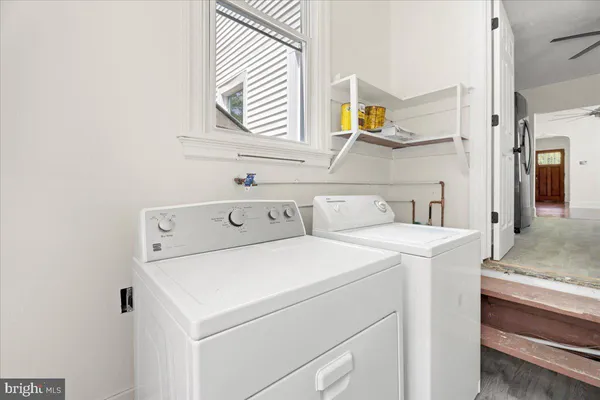 a utility room with dryer and washer
