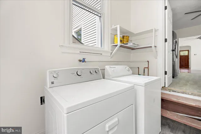 a utility room with dryer and washer