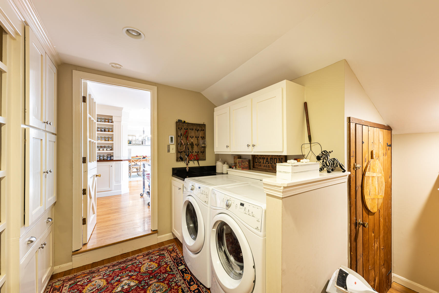 27 Chipman Road Sandwich, MA 02563 - Photo 13 of 44 a view of a kitchen with refrigerator and washer