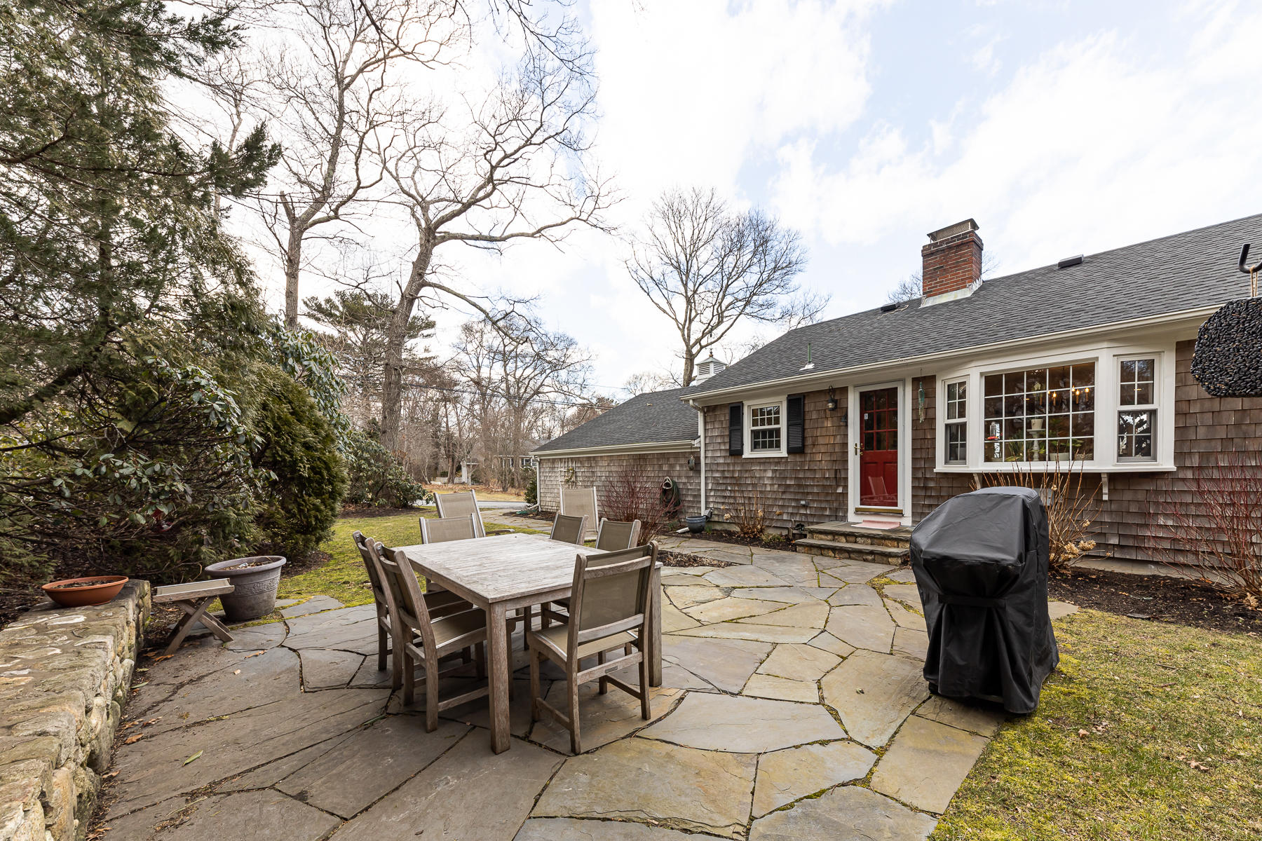 27 Chipman Road Sandwich, MA 02563 - Photo 38 of 44 a view of a house with a backyard and sitting area