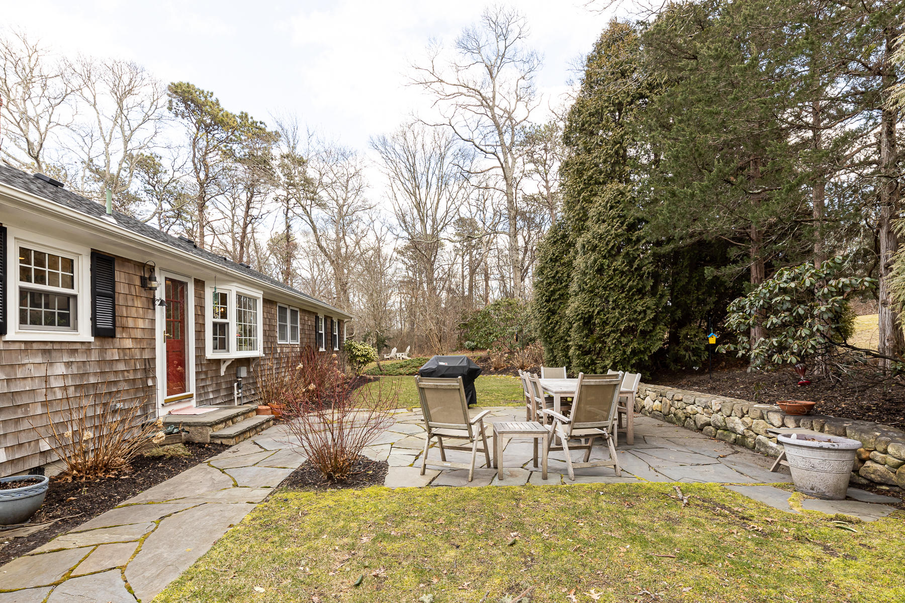 27 Chipman Road Sandwich, MA 02563 - Photo 40 of 44 a view of a house with backyard and sitting area