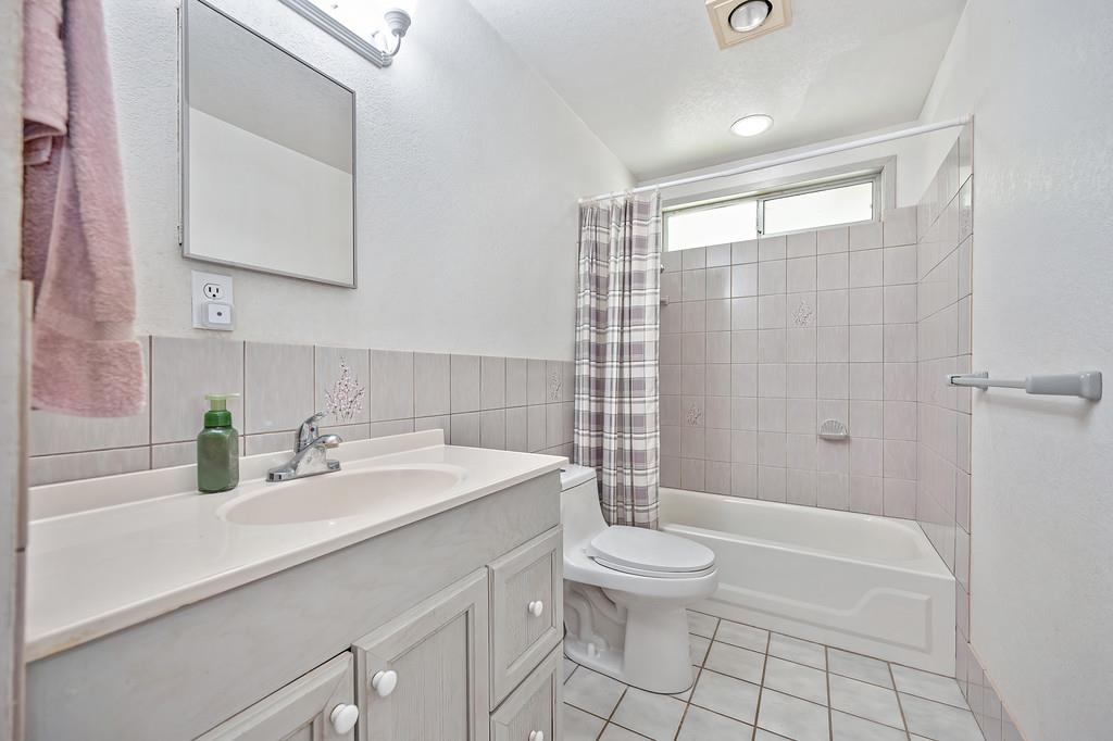 4751 Meadowview Acres Road Cool, CA 95614 - Photo 25 of 51 a bathroom with a sink a toilet and shower