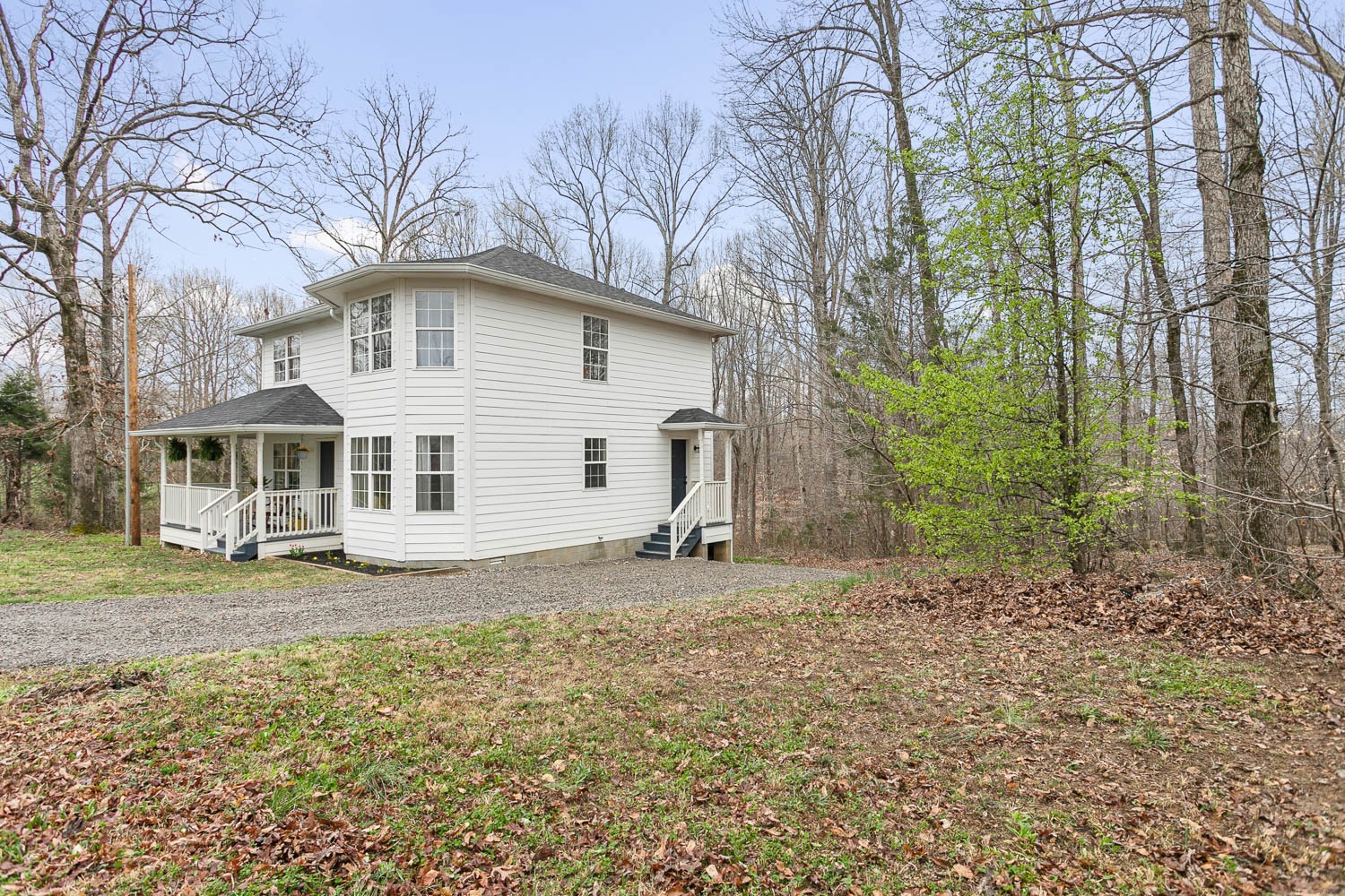 444 French Hill Road Tennessee Ridge, TN 37178 - Photo 5 of 42 a view of a house with a yard