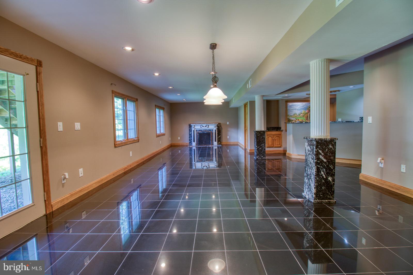 14016 Harrisville Road Mount Airy, MD 21771 - Photo 44 of 69 Lower level with marble floors, bar and more