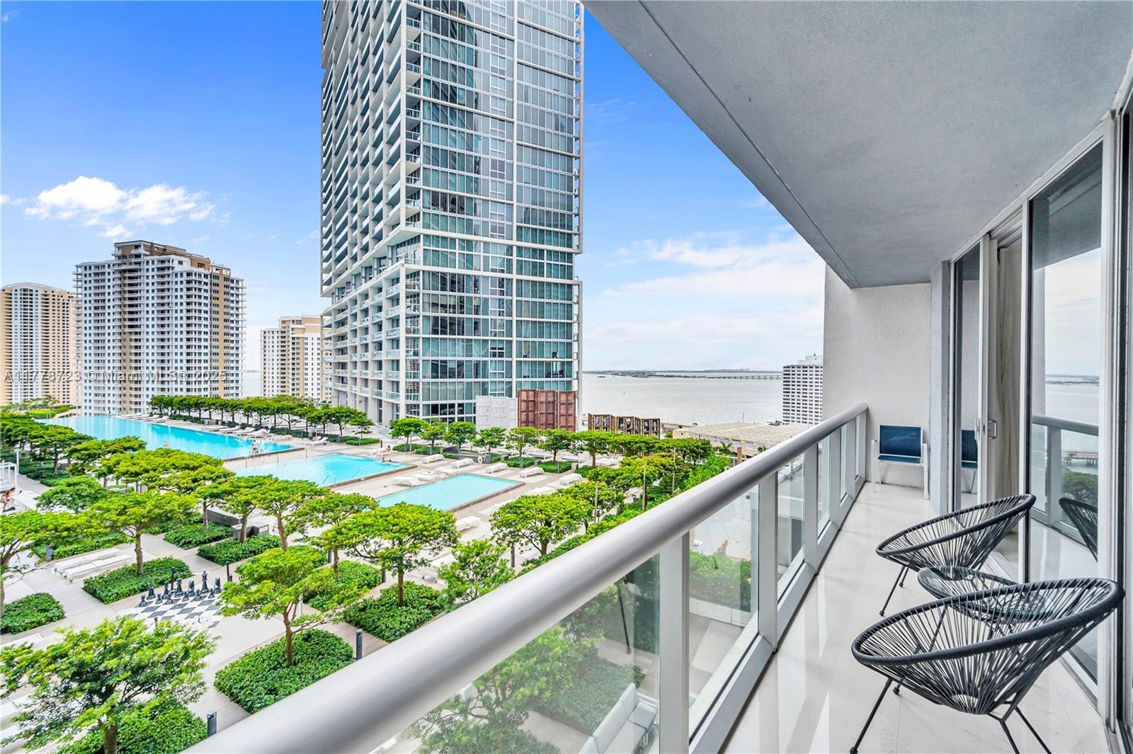 485 Brickell Avenue, Unit 1711 Miami, FL 33131 - Photo 12 of 15 a view of balcony with two chairs and a table