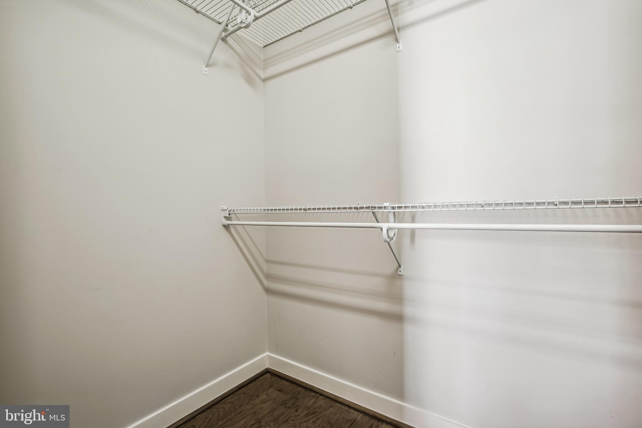 1320 Fenwick Lane, Unit 800 Silver Spring, MD 20910 - Photo 23 of 54 a view of a room with racks on the wall