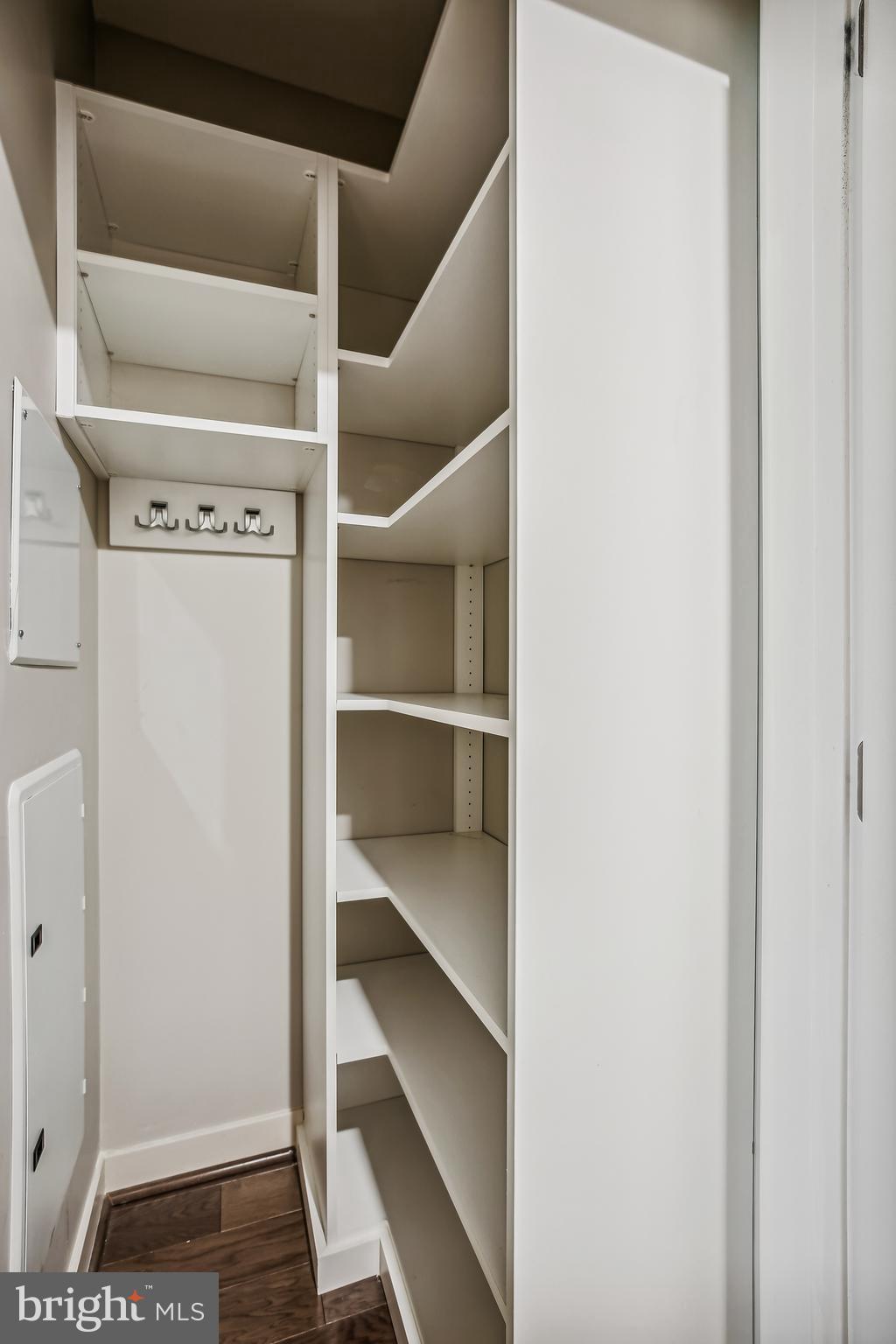 1320 Fenwick Lane, Unit 800 Silver Spring, MD 20910 - Photo 27 of 54 a view of walk in closet with empty racks