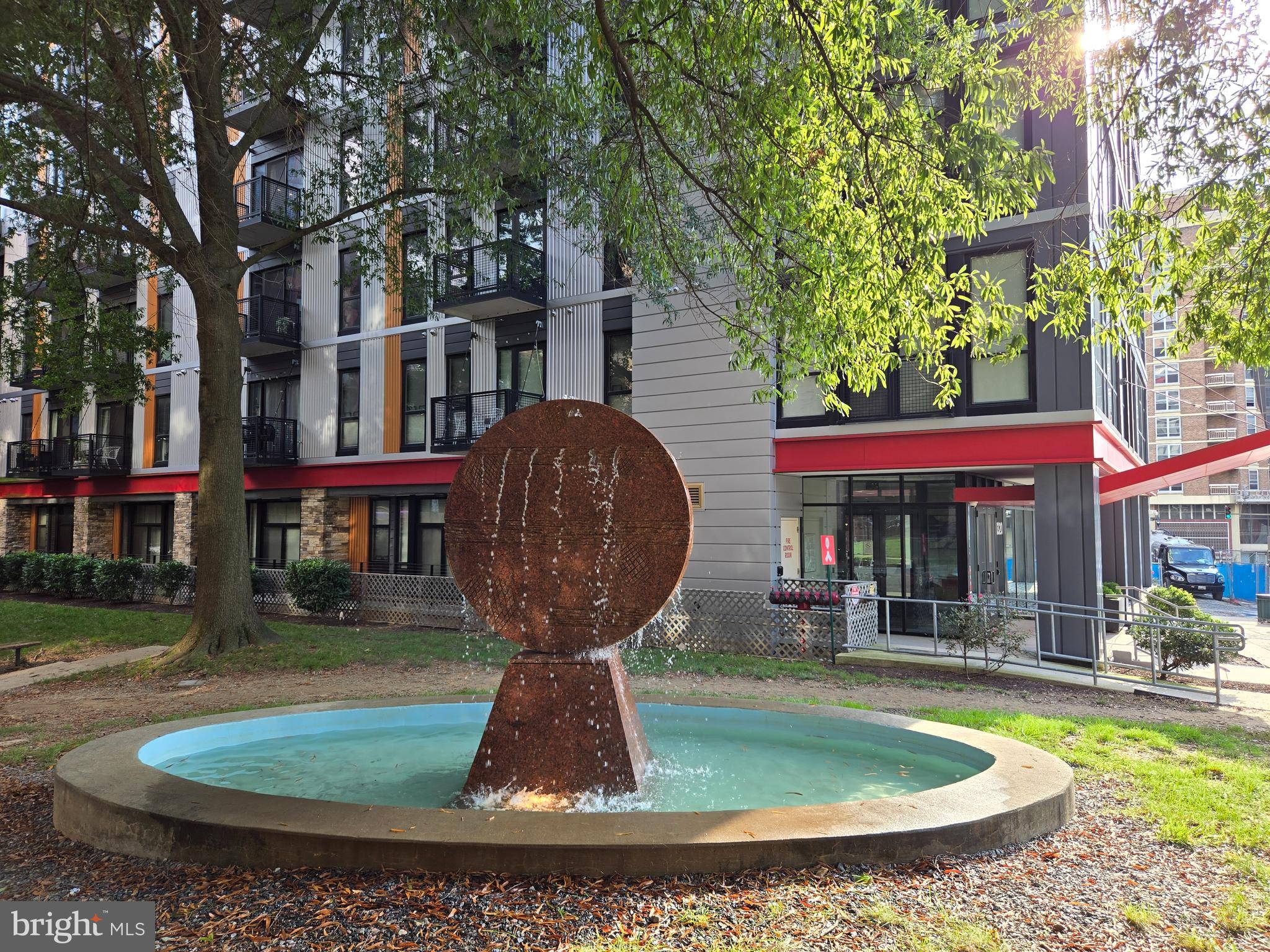 1320 Fenwick Lane, Unit 800 Silver Spring, MD 20910 - Photo 30 of 54 a front view of a house with garden