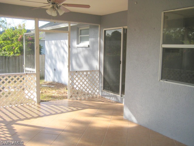 18229 Apple Road Fort Myers, FL 33967 - Photo 18 of 24 a view of a door front of a house