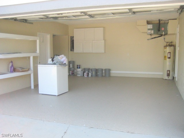 18229 Apple Road Fort Myers, FL 33967 - Photo 19 of 24 a view of kitchen and utility room