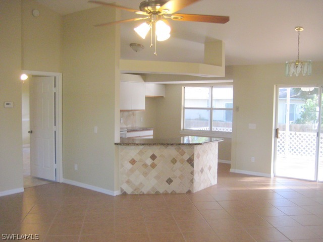 18229 Apple Road Fort Myers, FL 33967 - Photo 2 of 24 a view of kitchen with windows