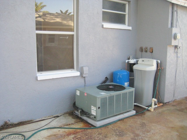 18229 Apple Road Fort Myers, FL 33967 - Photo 22 of 24 a room with a stove and a window