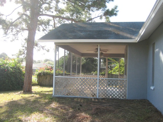 18229 Apple Road Fort Myers, FL 33967 - Photo 23 of 24 a view of a yard with a tree